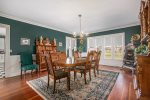 Formal dining room is perfect for gathering together to share a meal